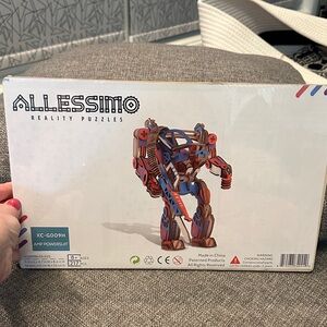 Reality Puzzles AMP Powersuit - Red and Blue